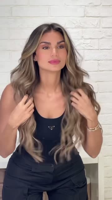 A finished cut shown from the back in the salon